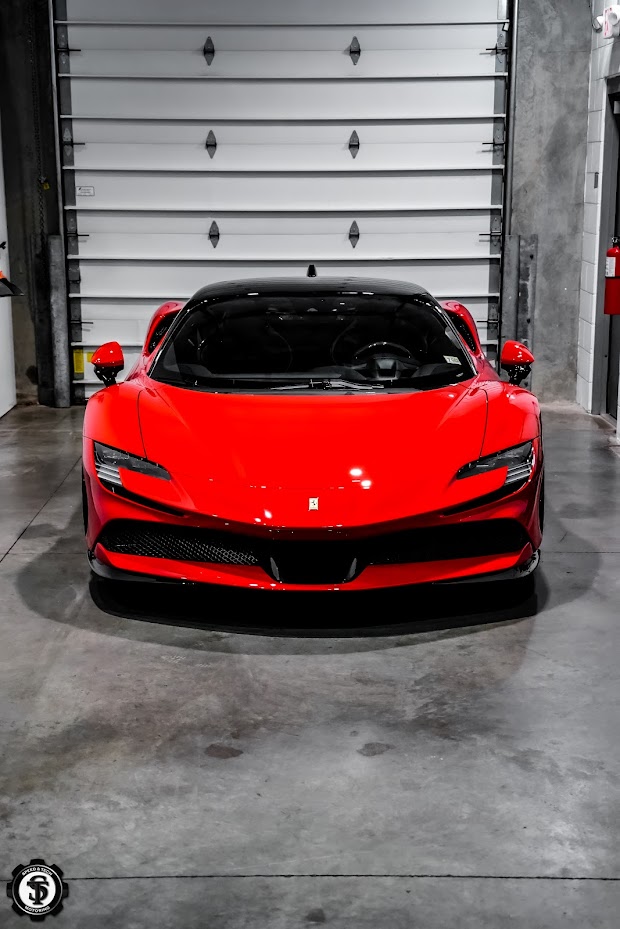 A stunning Ferrari SF90 Stradale with a flawless, glossy finish after receiving high-quality ceramic coating at Speed and Tech Motoring in Sterling, VA